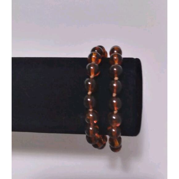 Vintage Bracelets Two Crown Trifari Faux Amber Beads Plastic Knotted Between - Picture 1 of 8